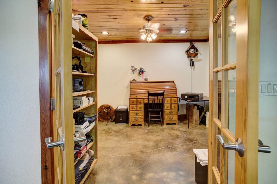 945 Justice Road West Point, TX 78963 - Photo 19 of 35 a view of walk in closet with clothes and shoes