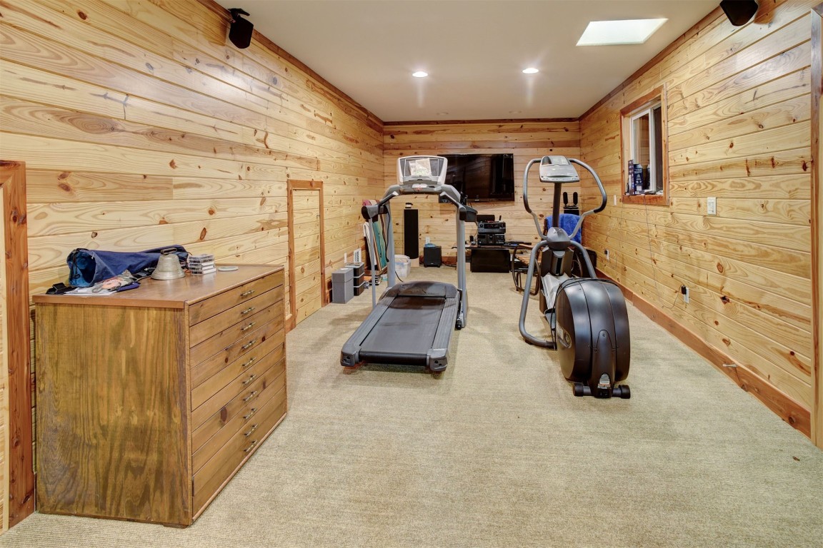 945 Justice Road West Point, TX 78963 - Photo 20 of 21 a room with gym equipment and a large window