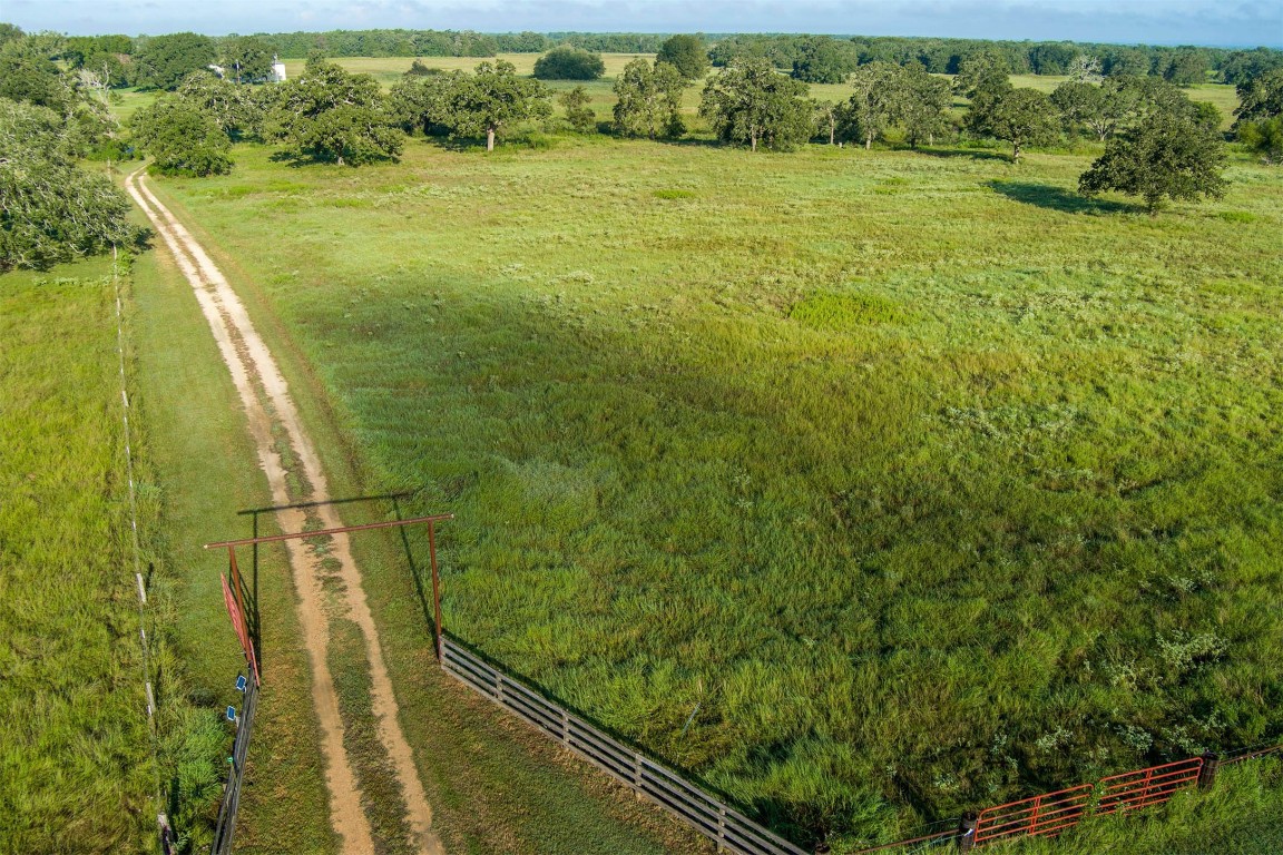 945 Justice Road West Point, TX 78963 - Photo 2 of 21 a view of a yard