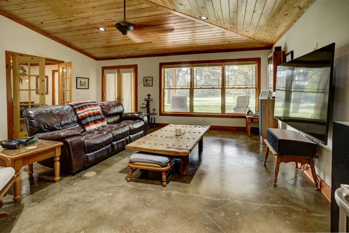 945 Justice Road West Point, TX 78963 - Photo 7 of 21 a living room with furniture and a large window