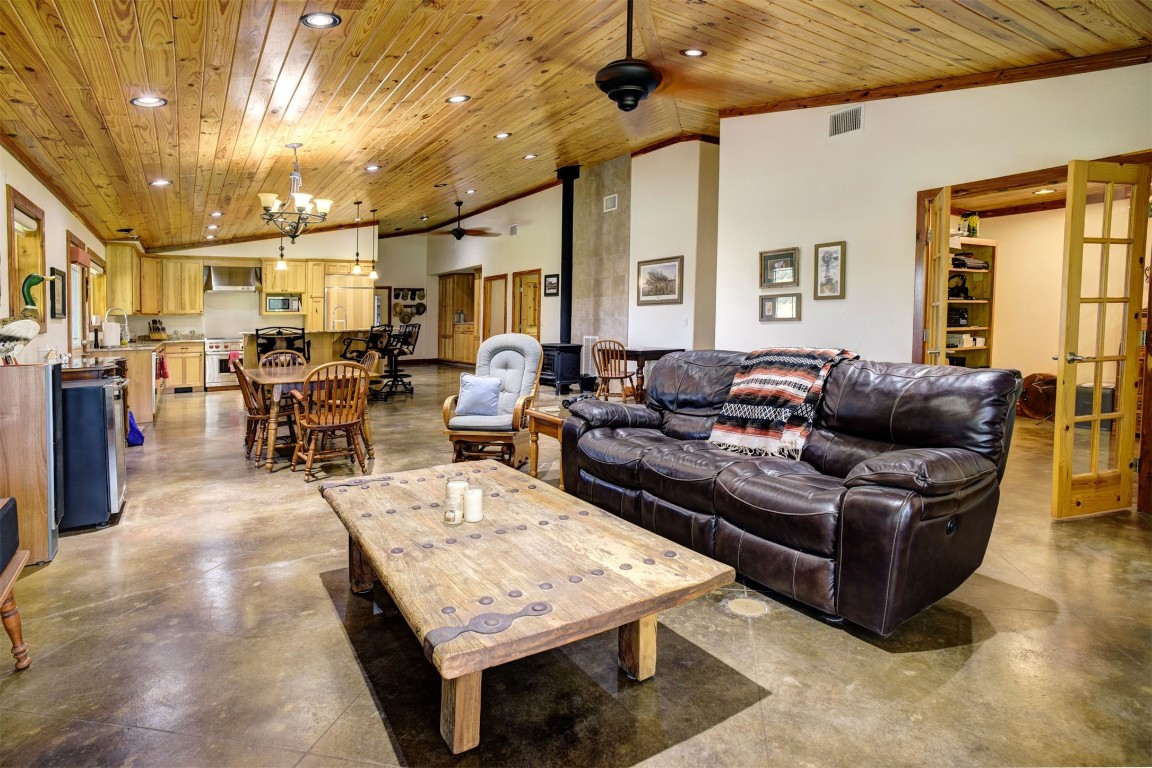 945 Justice Road West Point, TX 78963 - Photo 8 of 21 a living room with furniture a large window and a table