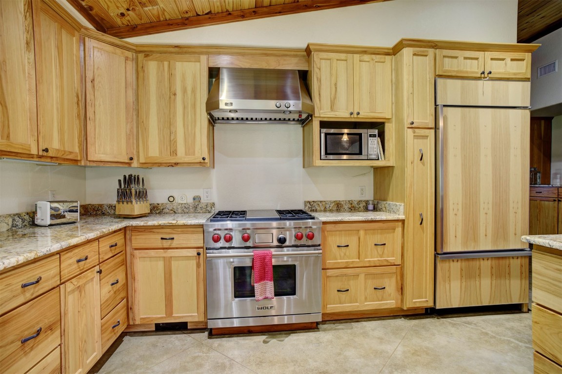 945 Justice Road West Point, TX 78963 - Photo 10 of 35 a kitchen with stainless steel appliances granite countertop a refrigerator a stove a sink and dishwasher