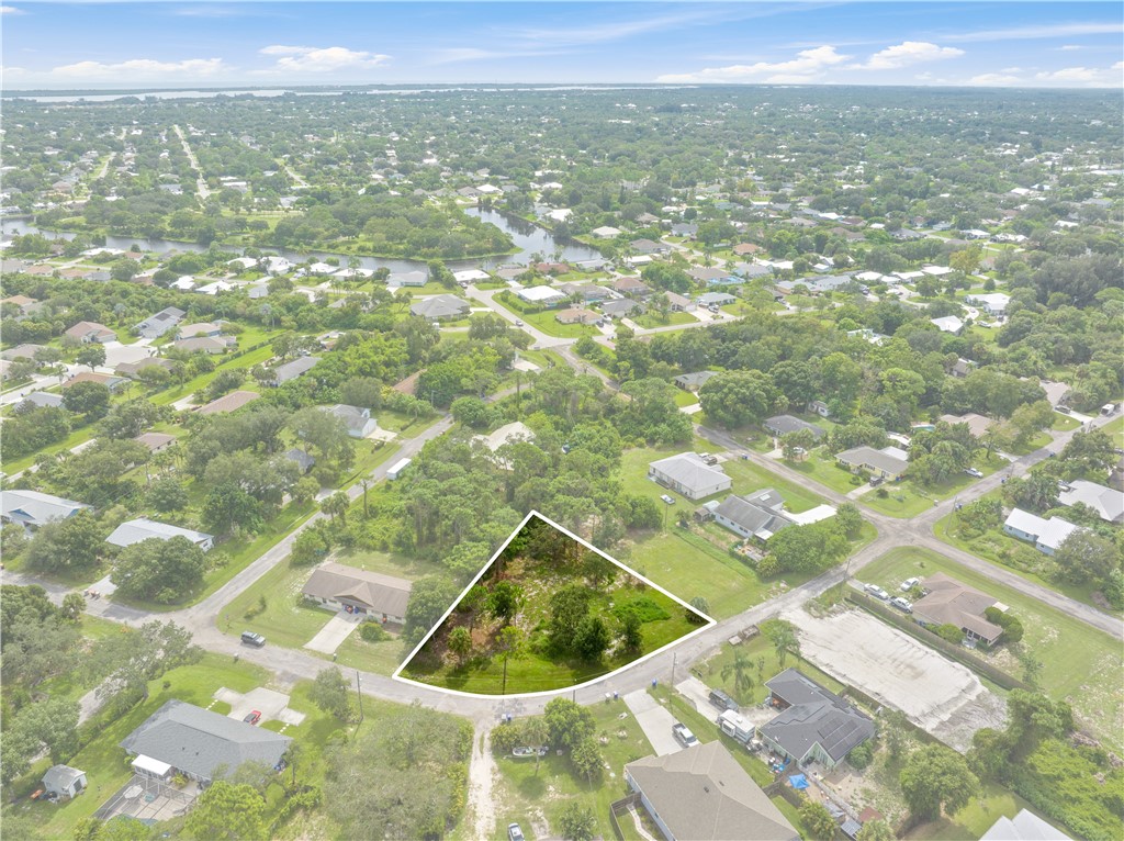 11136 Mulberry Street Sebastian, FL 32958 - Photo 6 of 11 a view of a lake from a balcony