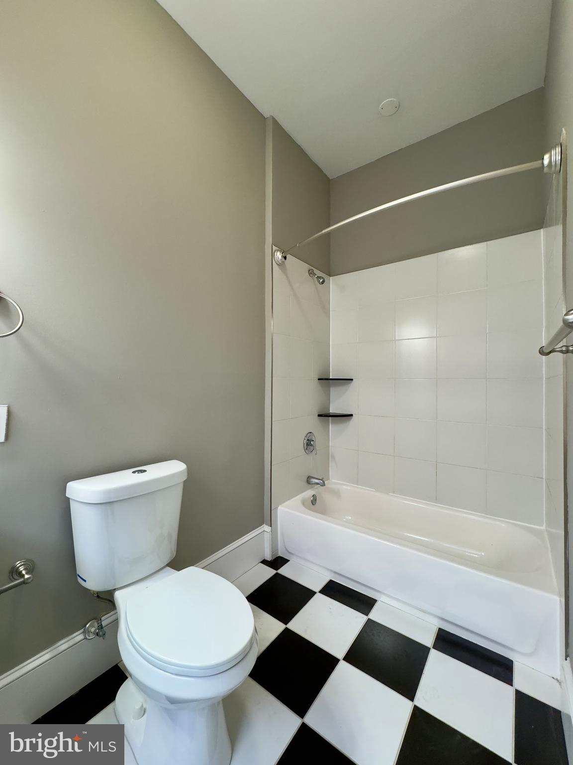 7 West Mulberry Street, Unit 8 Baltimore, MD 21201 - Photo 16 of 18 a bathroom with a toilet and a shower