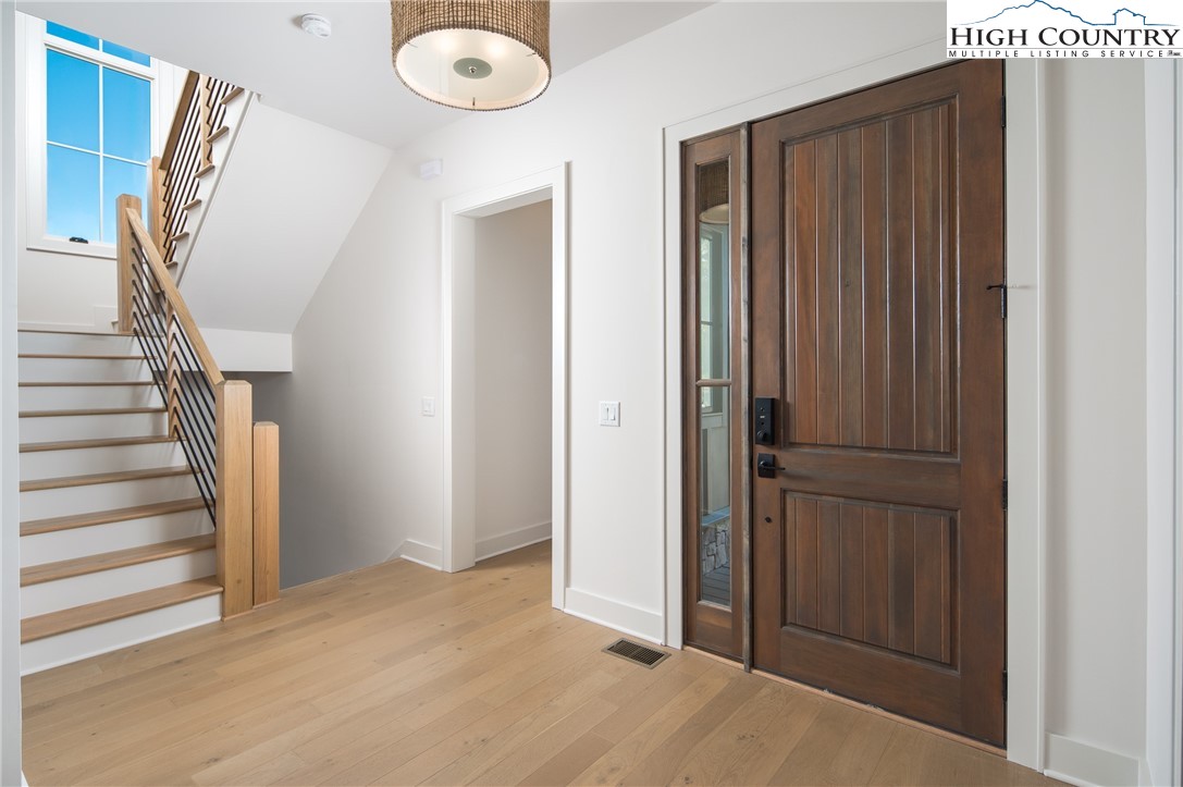 359 Calico Court Boone, NC 28607 - Photo 22 of 50 a view of entryway with wooden floor
