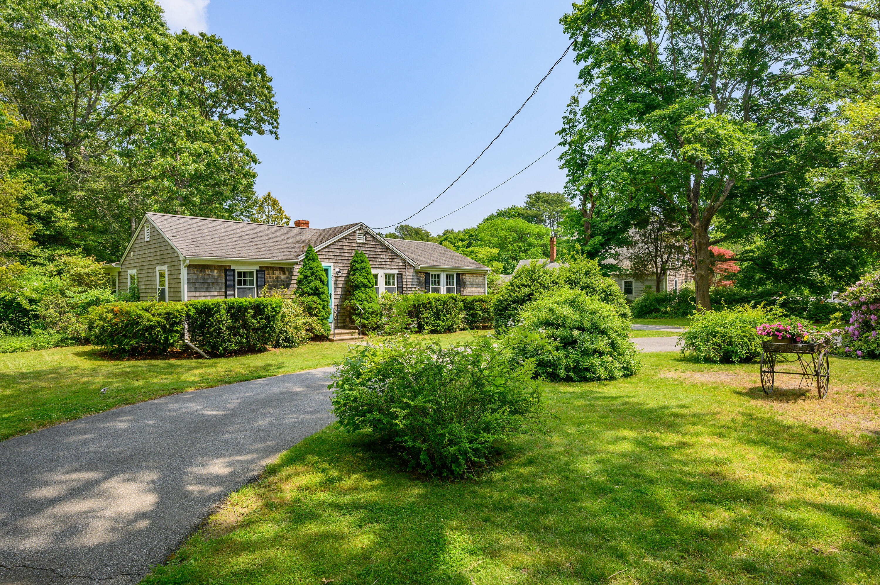 120 Main Street Cotuit, MA 02635 - Photo 1 of 40 a view of outdoor space yard and patio