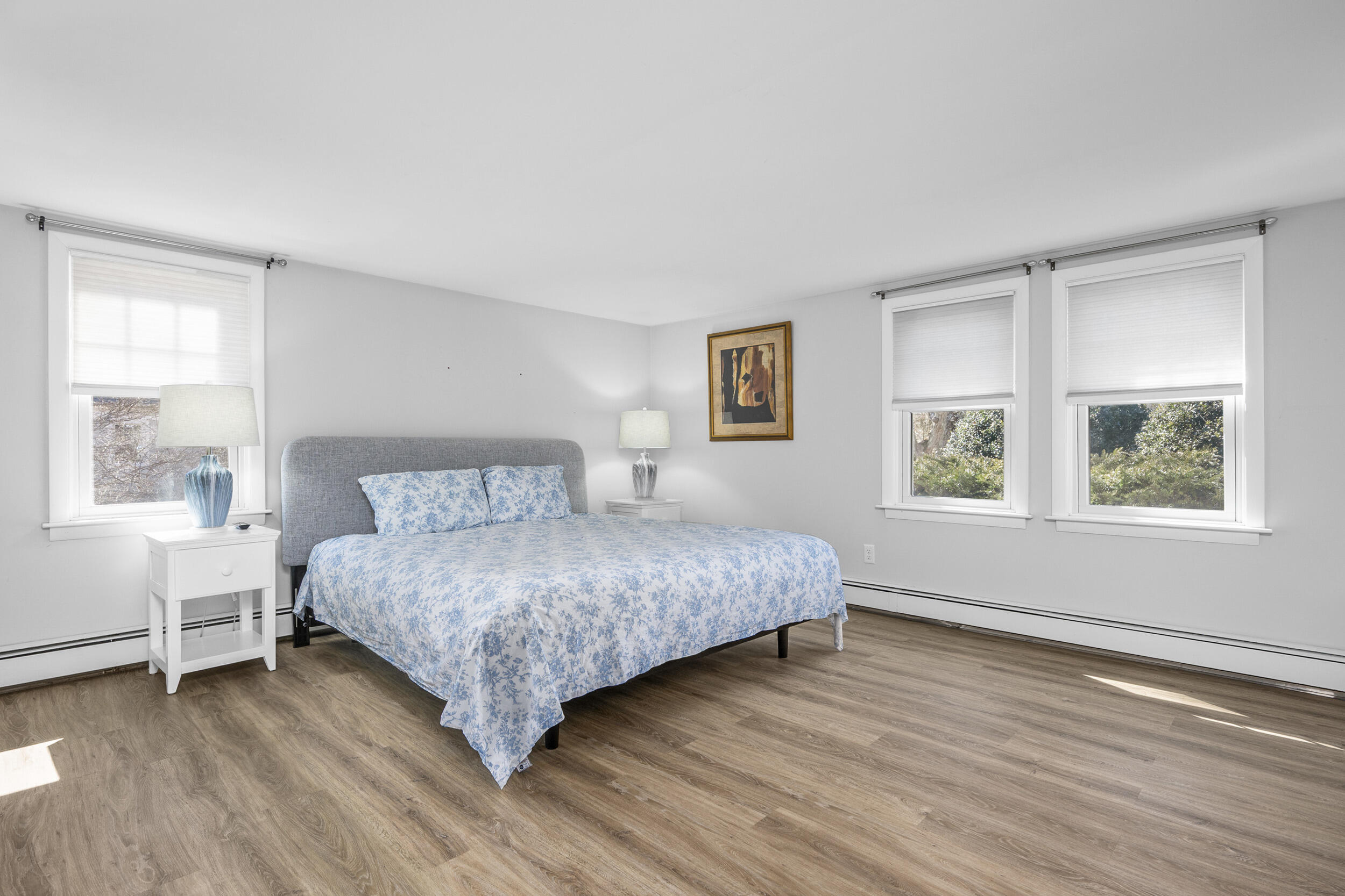 120 Main Street Cotuit, MA 02635 - Photo 14 of 40 a bedroom with a bed and a window