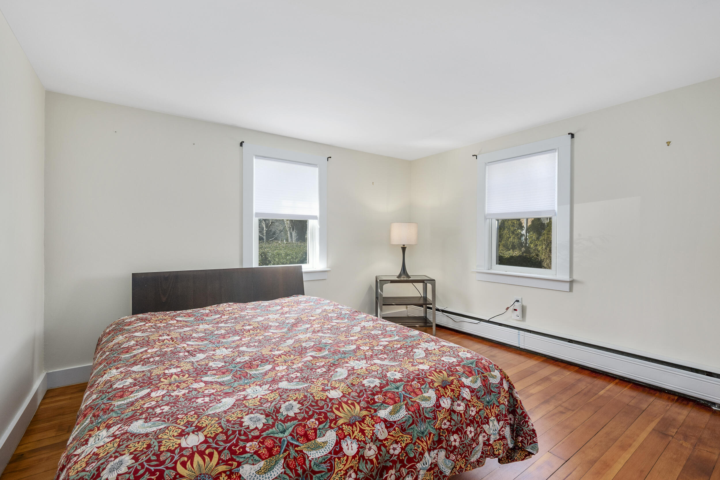 120 Main Street Cotuit, MA 02635 - Photo 18 of 40 a bedroom with a bed and a window