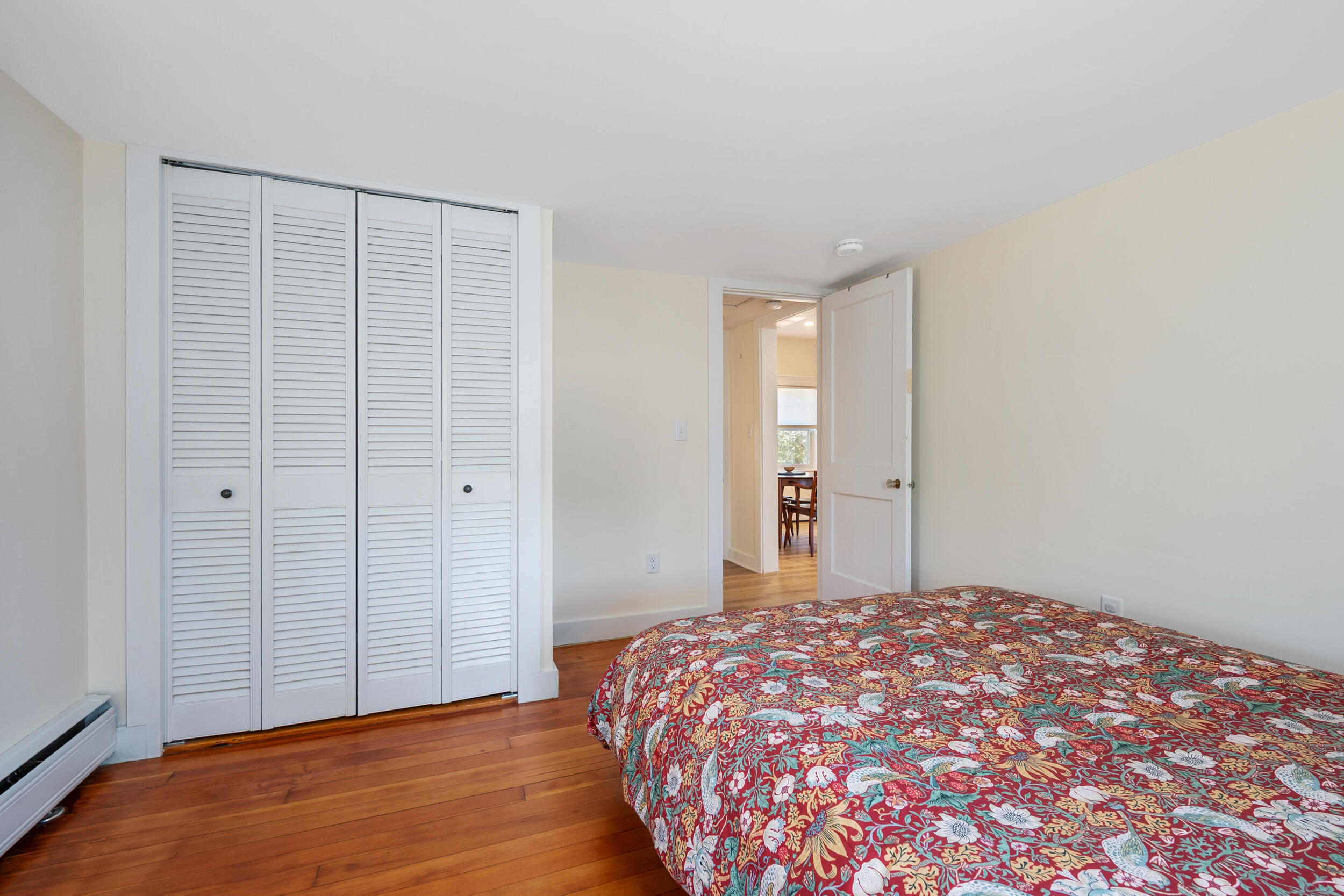 120 Main Street Cotuit, MA 02635 - Photo 20 of 40 a bedroom with a bed and a window