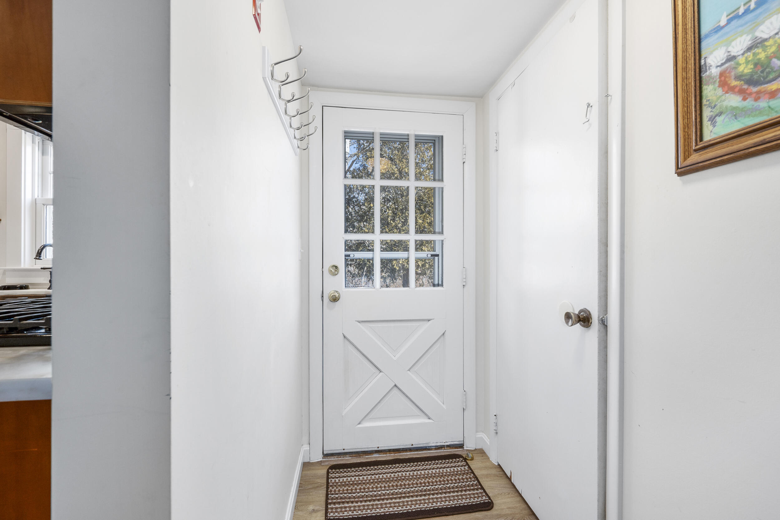 120 Main Street Cotuit, MA 02635 - Photo 24 of 40 a view of wooden floor and a window