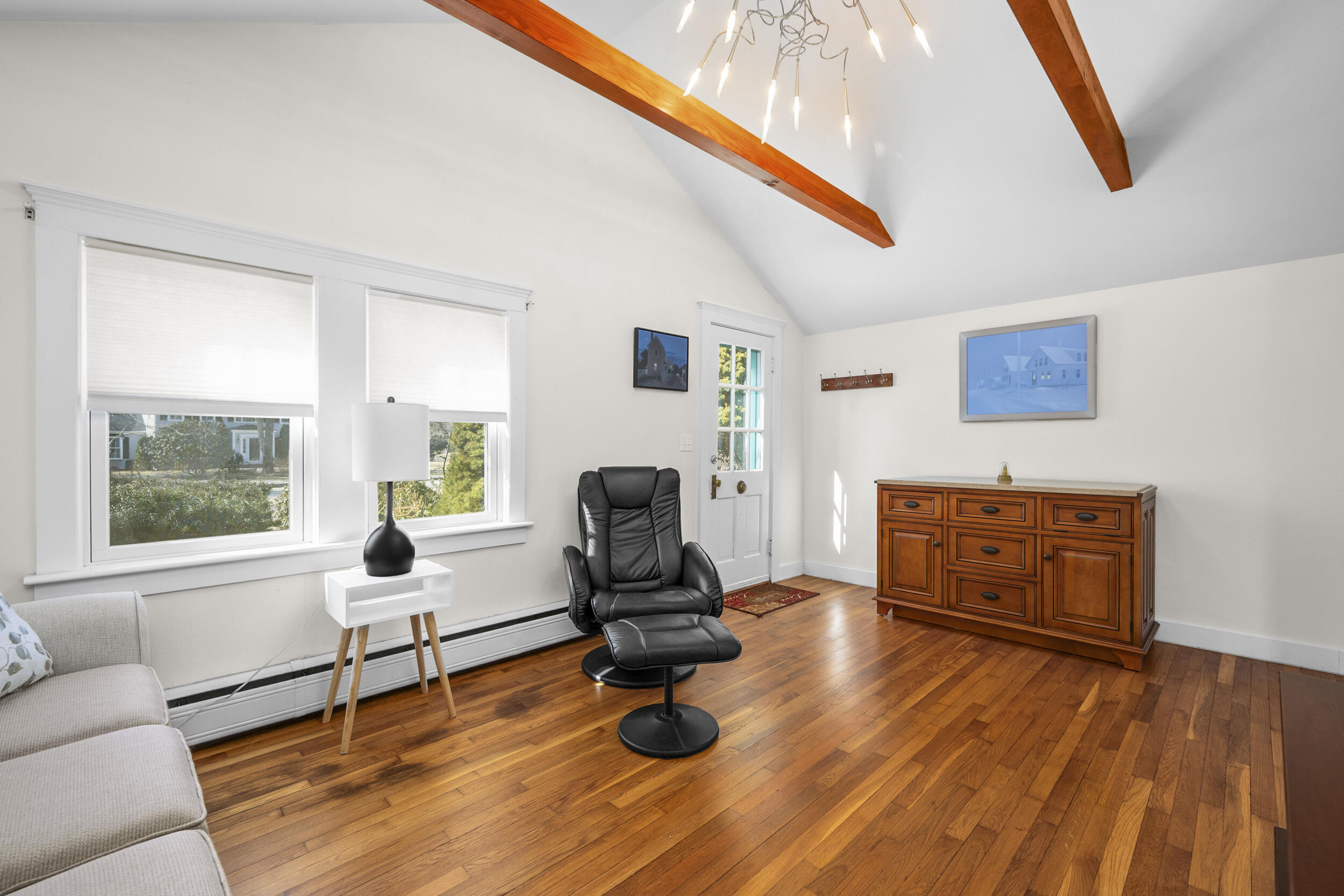 120 Main Street Cotuit, MA 02635 - Photo 8 of 40 a view of a workspace with furniture and a window