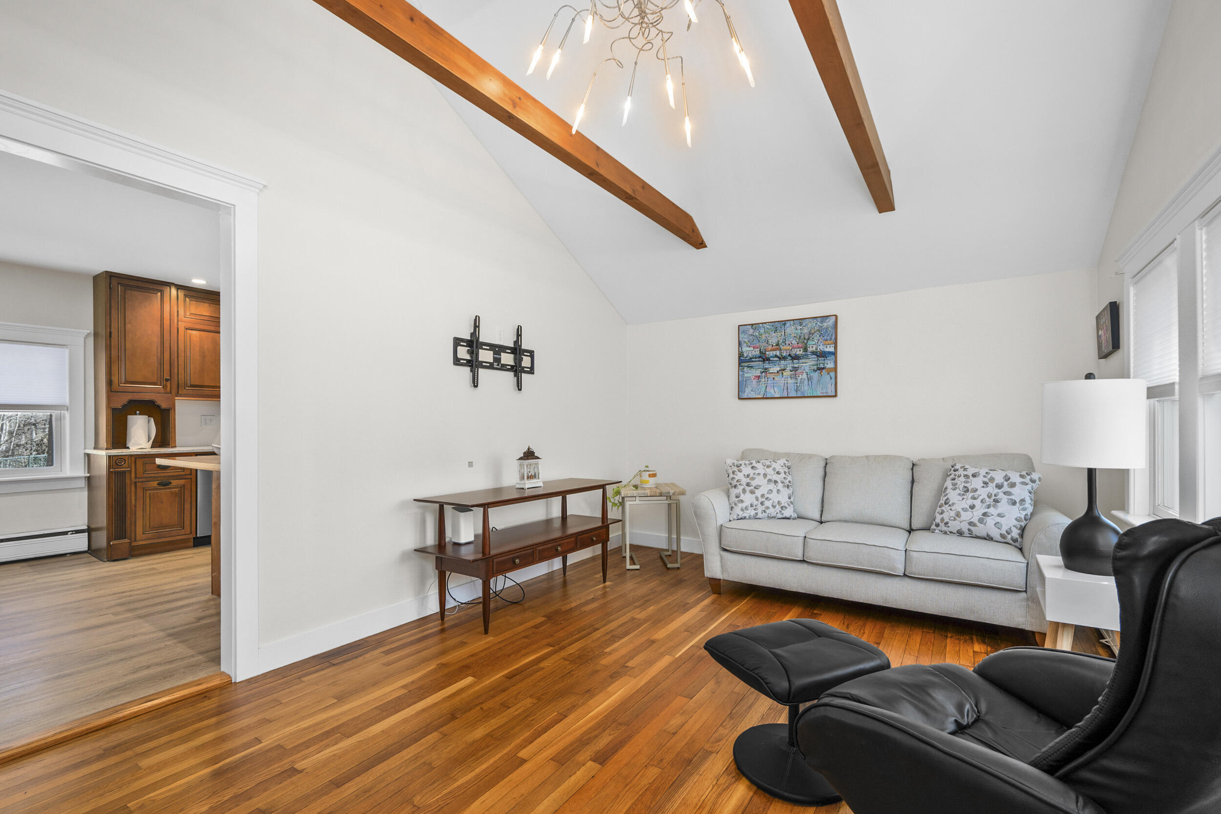 120 Main Street Cotuit, MA 02635 - Photo 9 of 40 a living room with furniture and a wooden floor
