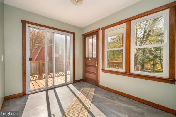 a view of a room with a large window