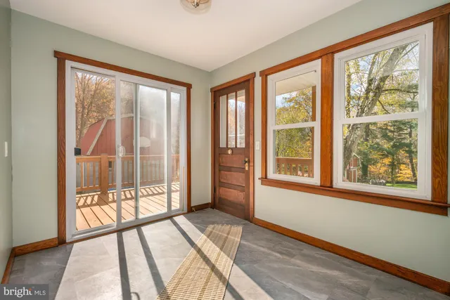 a view of a room with a large window