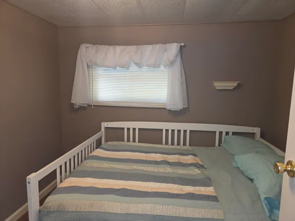 a bedroom with a bed