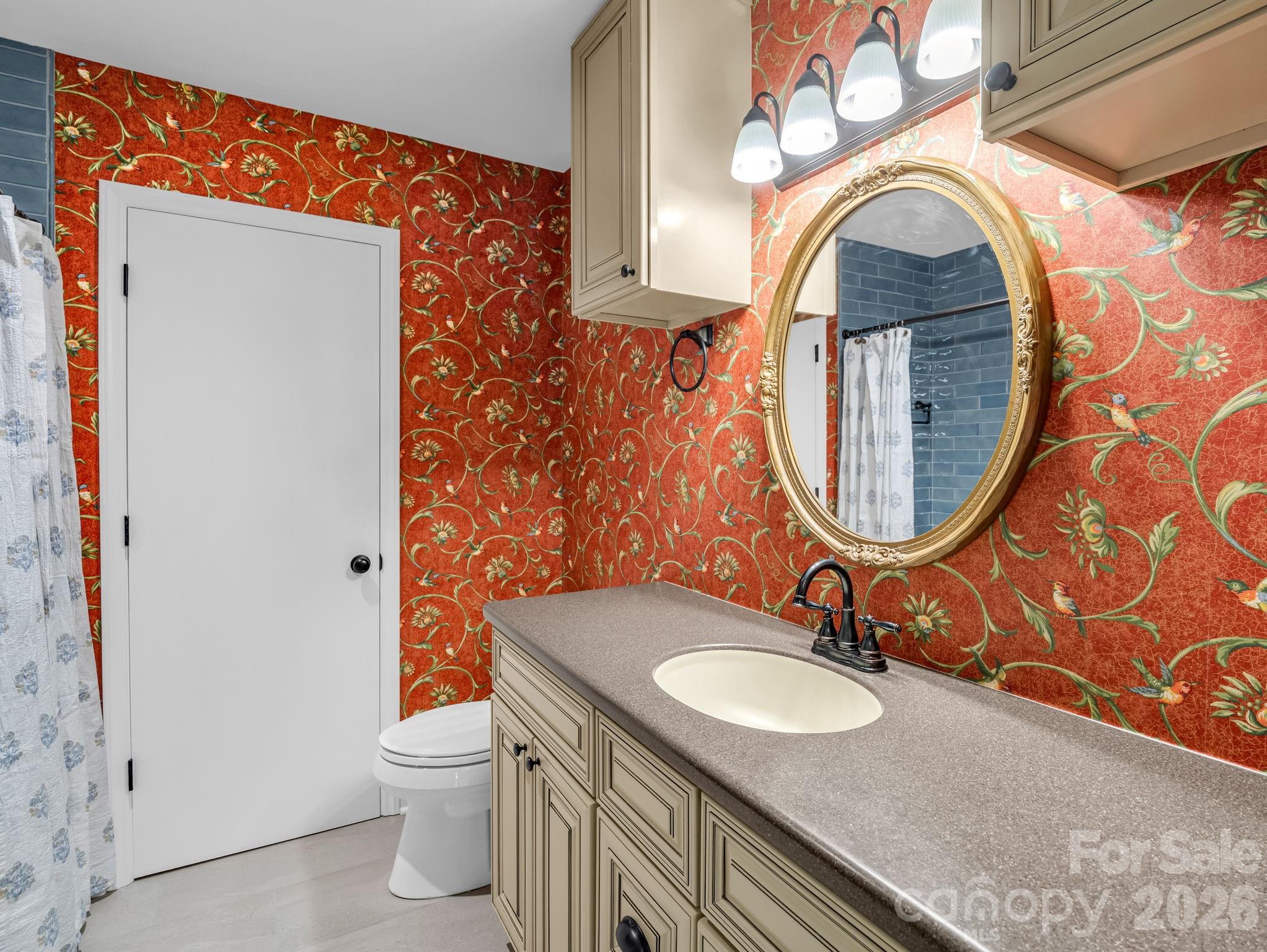 44 Jervey Road, Unit 4C Tryon, NC 28782 - Photo 25 of 35 a bathroom with a sink and a mirror