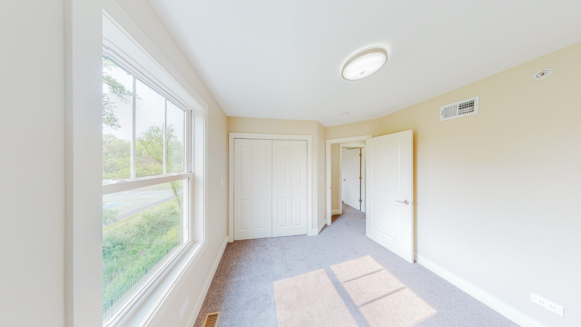 516 Highlands Parkway Itasca, IL 60143 - Photo 13 of 18 a view of hallway with a large window and front door