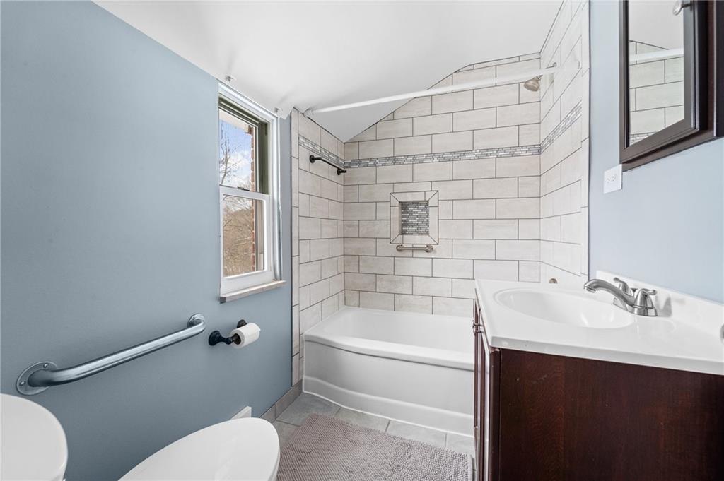 1015 McNeilly Road Pittsburgh, PA 15226 - Photo 12 of 19 a bathroom with a sink toilet and shower