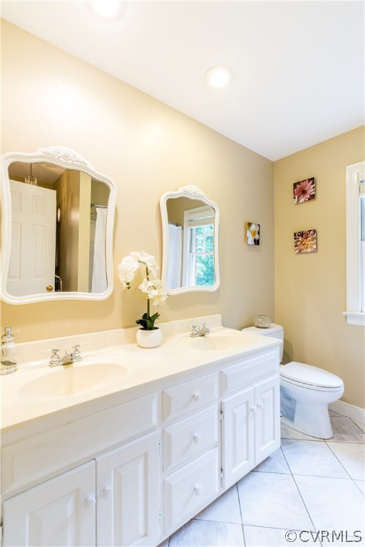 3521 Buckhead Road Midlothian, VA 23113 - Photo 29 of 48 a bathroom with a sink a toilet and mirror
