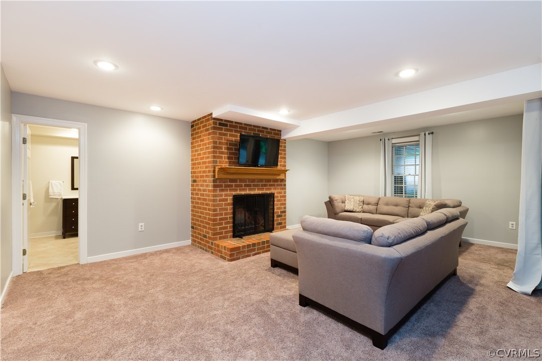 3521 Buckhead Road Midlothian, VA 23113 - Photo 33 of 48 a living room with furniture and a fireplace