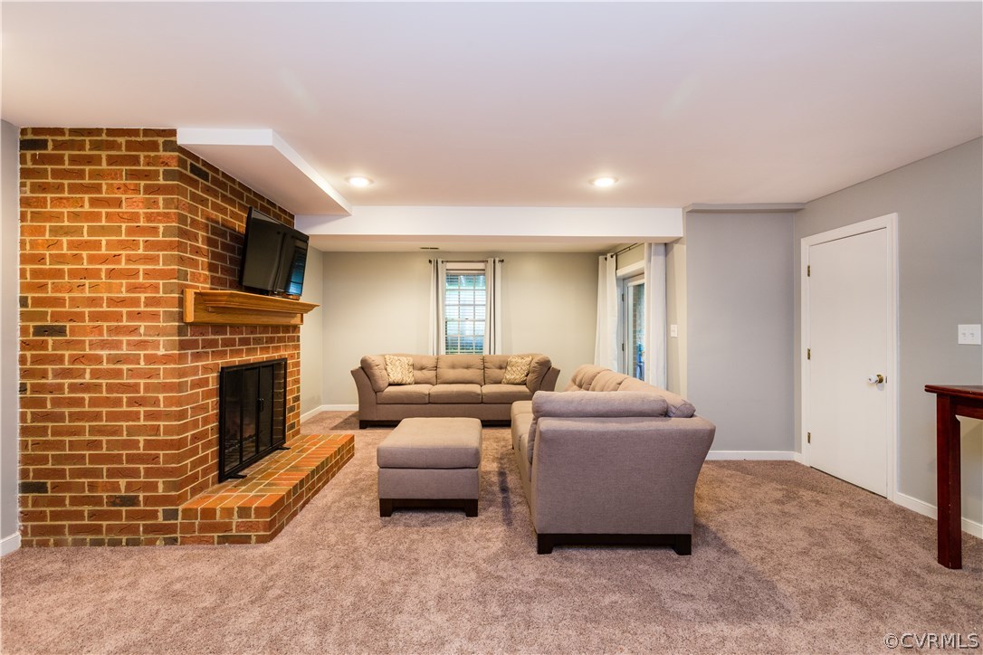 3521 Buckhead Road Midlothian, VA 23113 - Photo 35 of 48 a living room with furniture and a fireplace