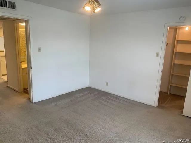 a storage room with washer and dryer