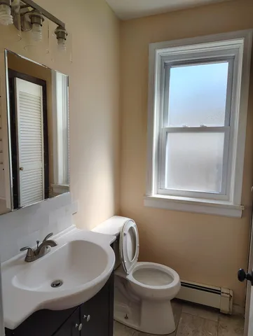 a bathroom with a sink and a toilet