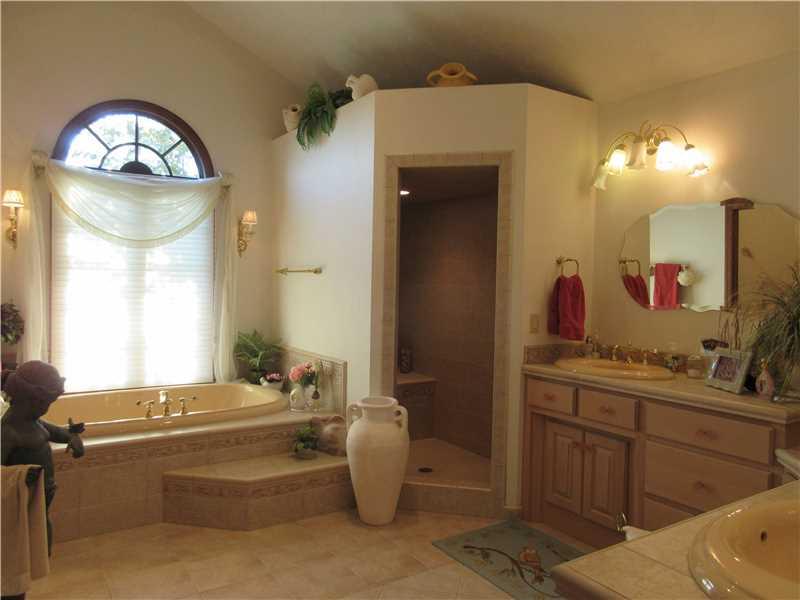 675 Freeport Road Freeport, PA 16229 - Photo 17 of 25 Master Bath/Spa. Master bath includes jet spray tub, sauna, and his and her sinks.