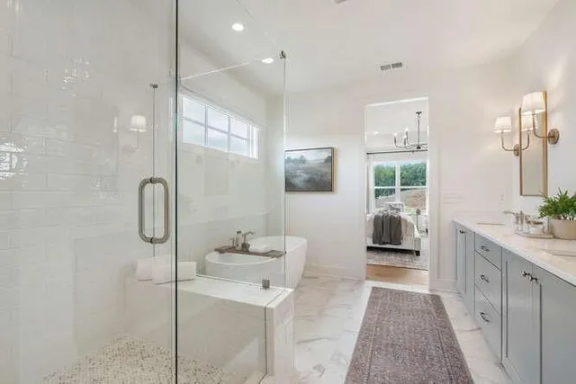 a view of a patio with table and chairs