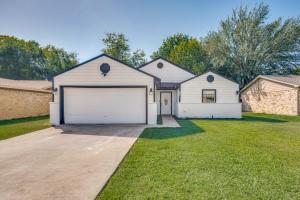 3820 Royal Crest Drive Fort Worth, TX 76140 - Photo 1 of 1 a front view of a house with garden