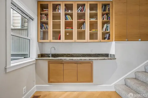 an aerial view of residential house with parking space