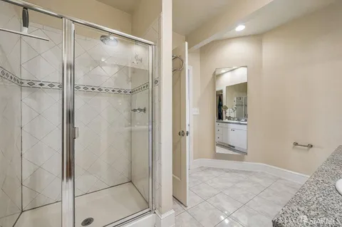 an aerial view of a house with outdoor space