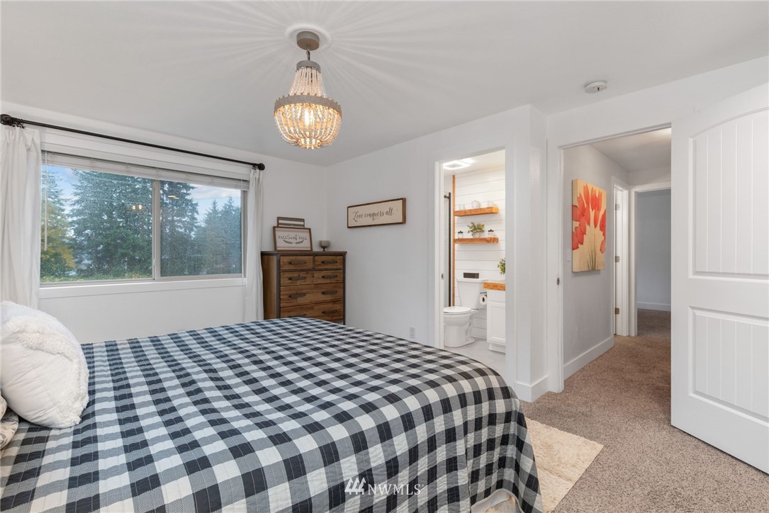3118 167th Street Southeast Bothell, WA 98012 - Photo 22 of 38 a bedroom with a bed and a window