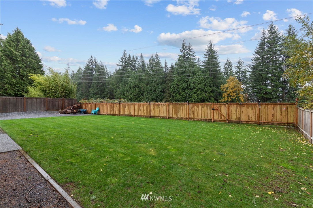 3118 167th Street Southeast Bothell, WA 98012 - Photo 34 of 38 a view of a yard with a slide