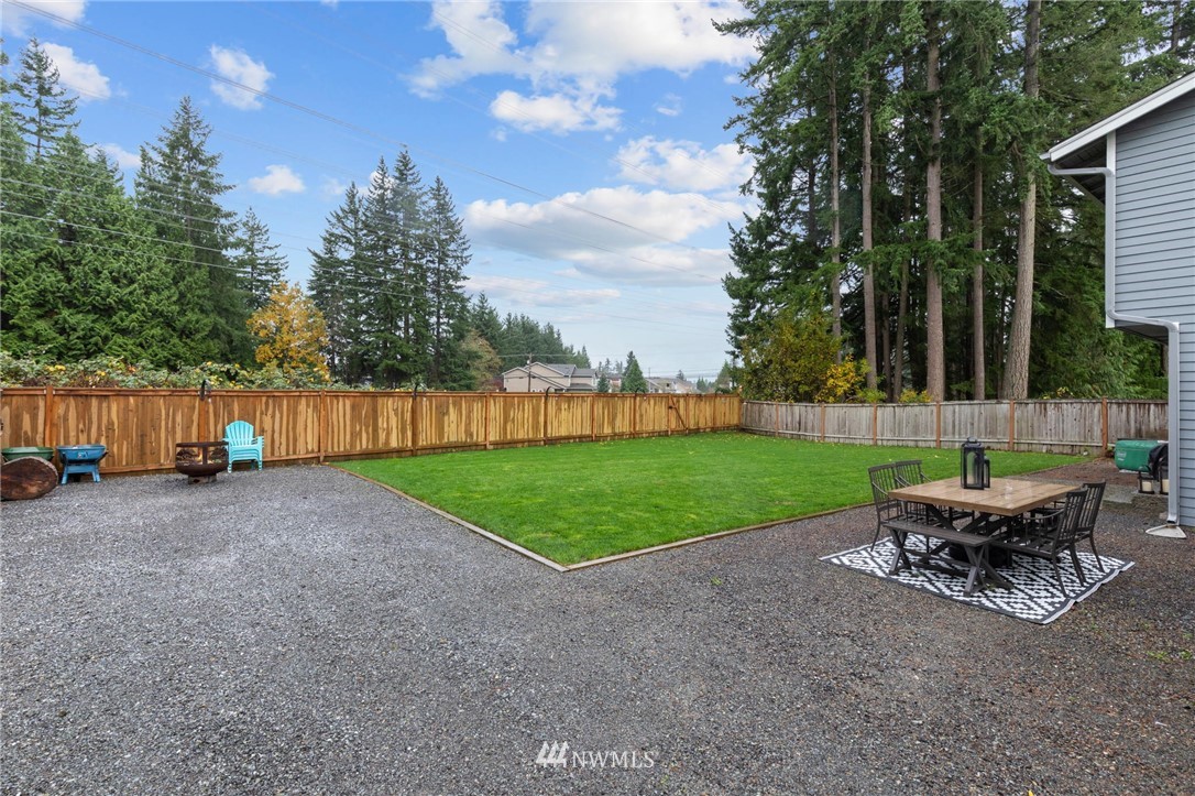 3118 167th Street Southeast Bothell, WA 98012 - Photo 37 of 38 a view of a backyard with a garden and entertaining space