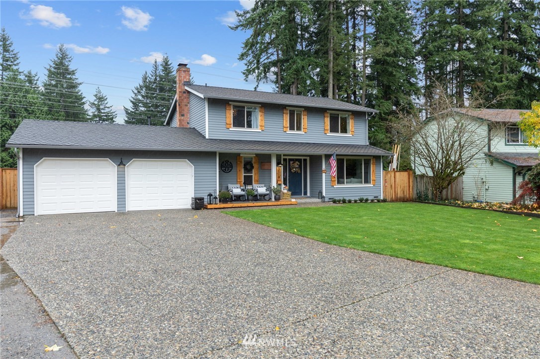 3118 167th Street Southeast Bothell, WA 98012 - Photo 38 of 38 a house view with a garden space