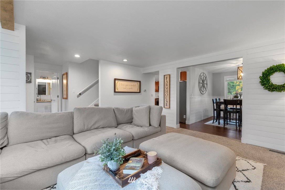 3118 167th Street Southeast Bothell, WA 98012 - Photo 5 of 38 a living room with furniture and a couch