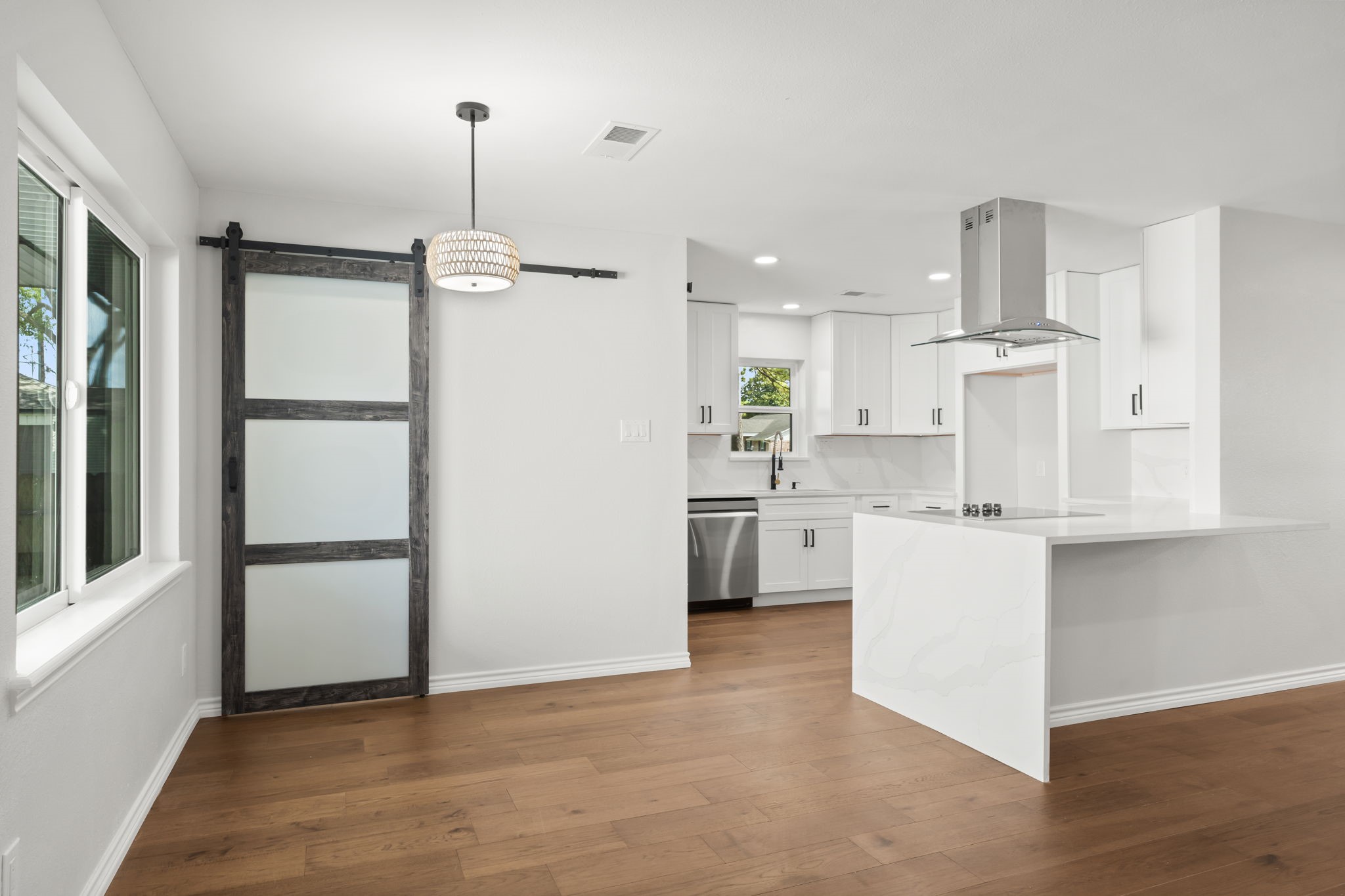 2535 Southwick Street Houston, TX 77080 - Photo 10 of 26 a kitchen with white cabinets and white appliances