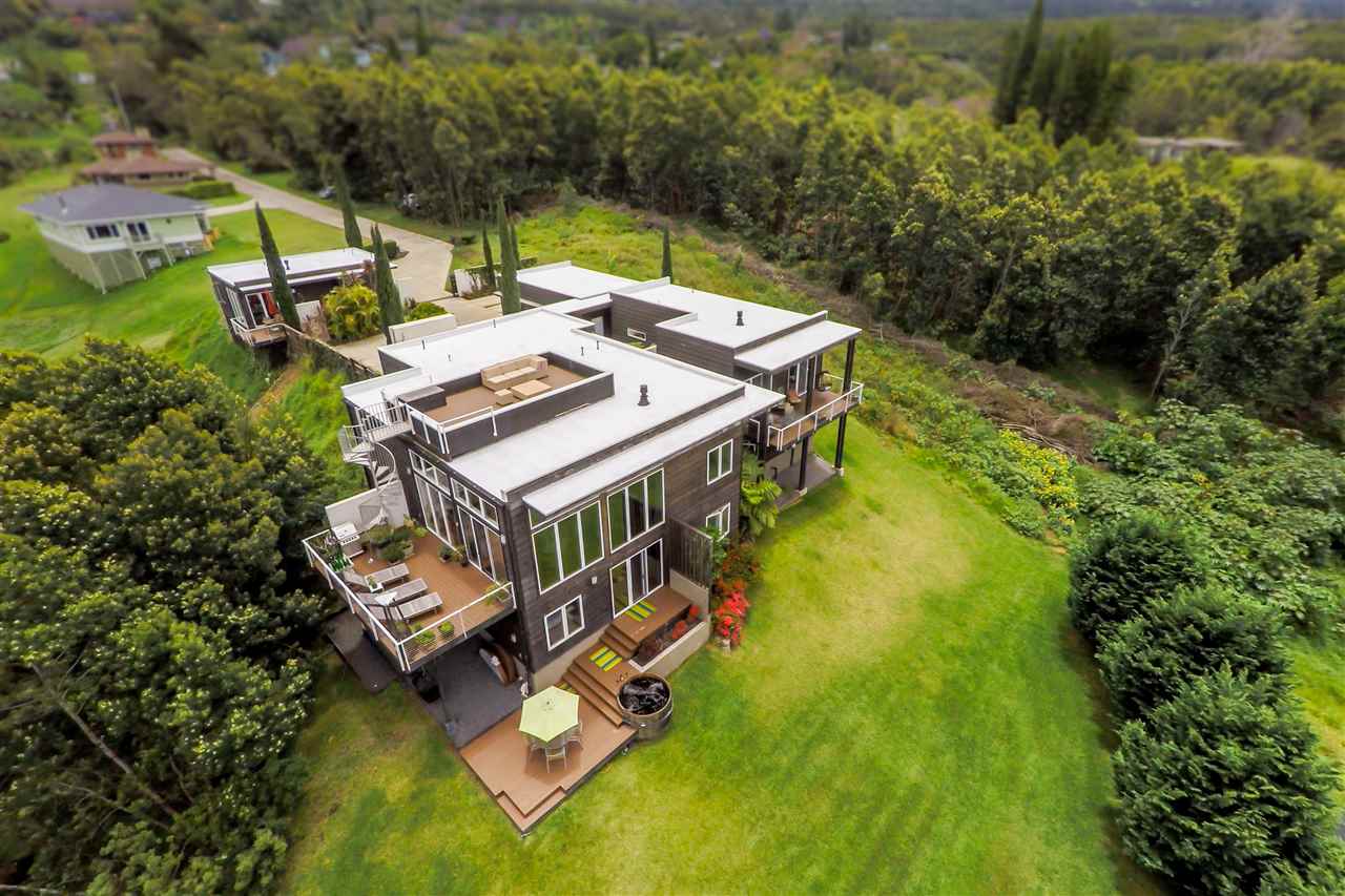 120-122 Ainakula Road Kula, HI 96790 - Photo 25 of 28 an aerial view of a house with swimming pool and trees