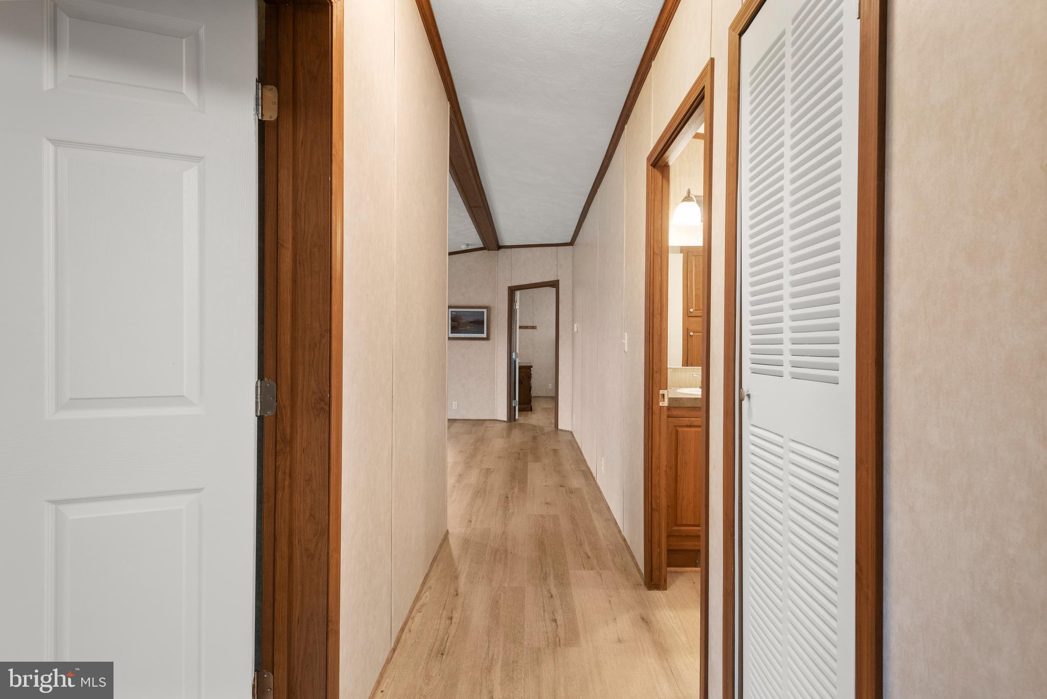 47 Janis Road Gordonville, PA 17529 - Photo 16 of 26 a view of a hallway with wooden floor and stairs
