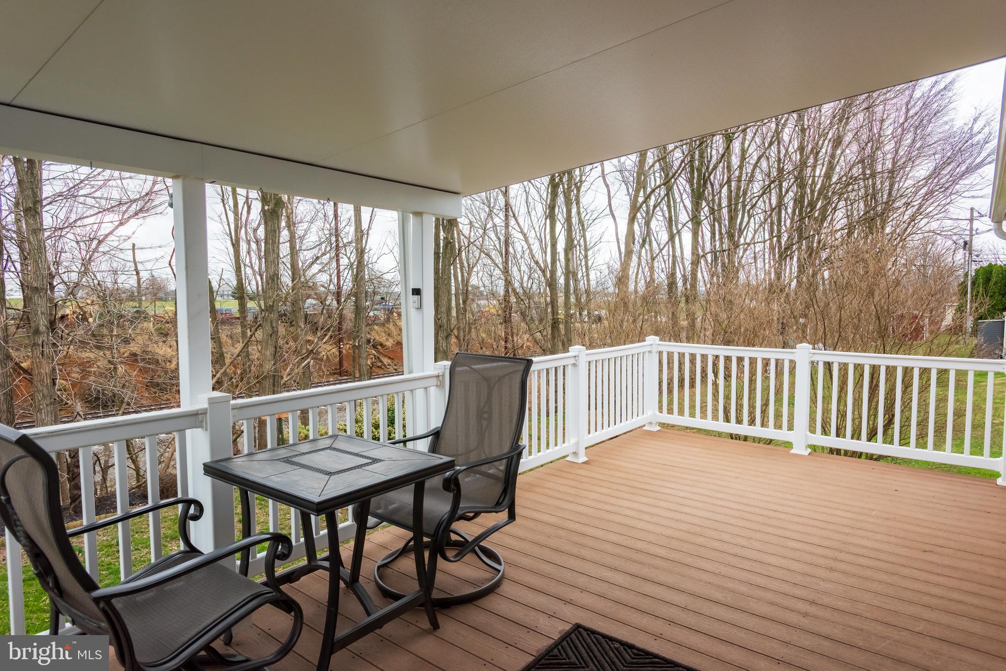 47 Janis Road Gordonville, PA 17529 - Photo 21 of 26 a view of a two chairs and table in the deck