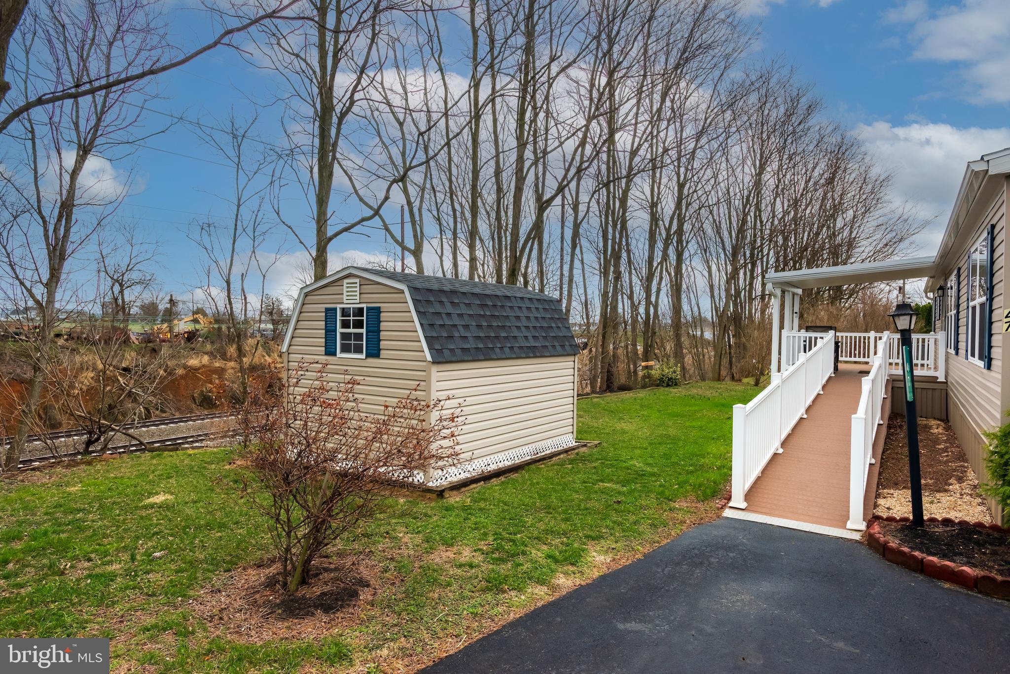 47 Janis Road Gordonville, PA 17529 - Photo 24 of 26 a view of a house with a yard