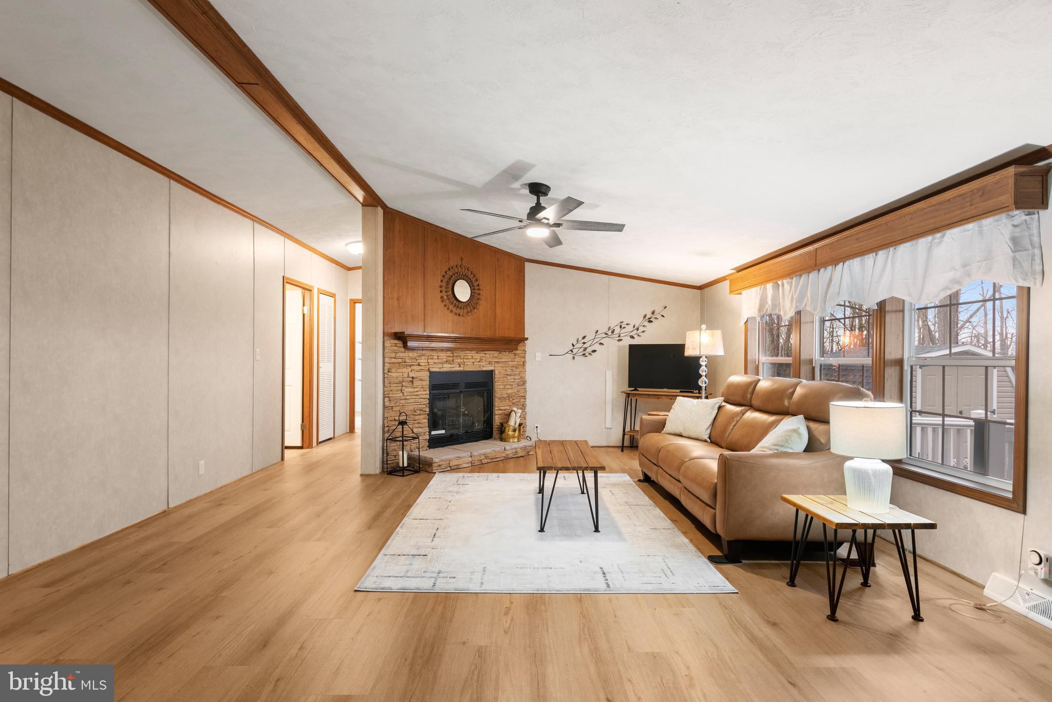 47 Janis Road Gordonville, PA 17529 - Photo 4 of 26 a living room with furniture and a fireplace