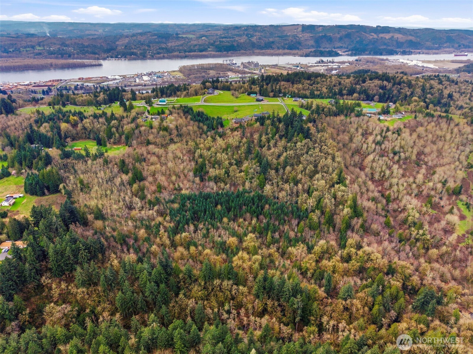0 Spencer Creek Road Kalama, WA 98625 - Photo 3 of 25 a view of a city with tall trees