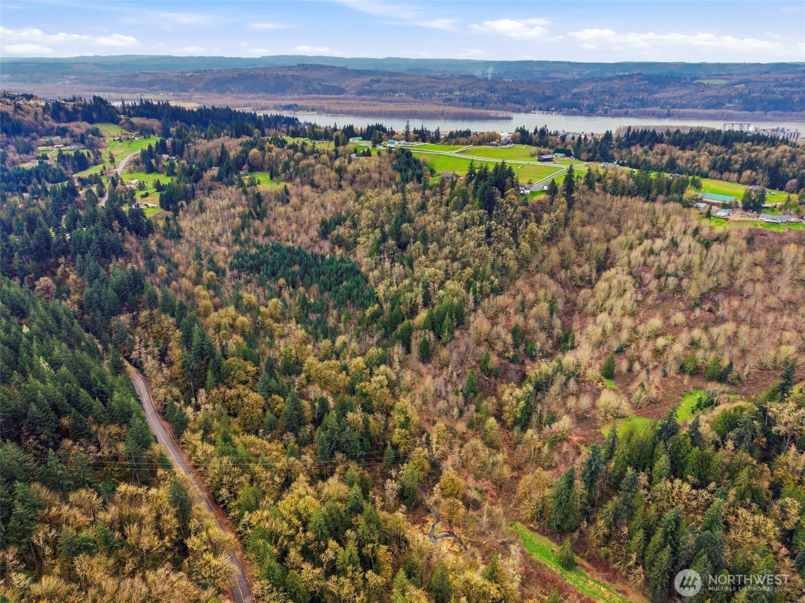 0 Spencer Creek Road Kalama, WA 98625 - Photo 6 of 24 a view of a lake with a mountain in the background