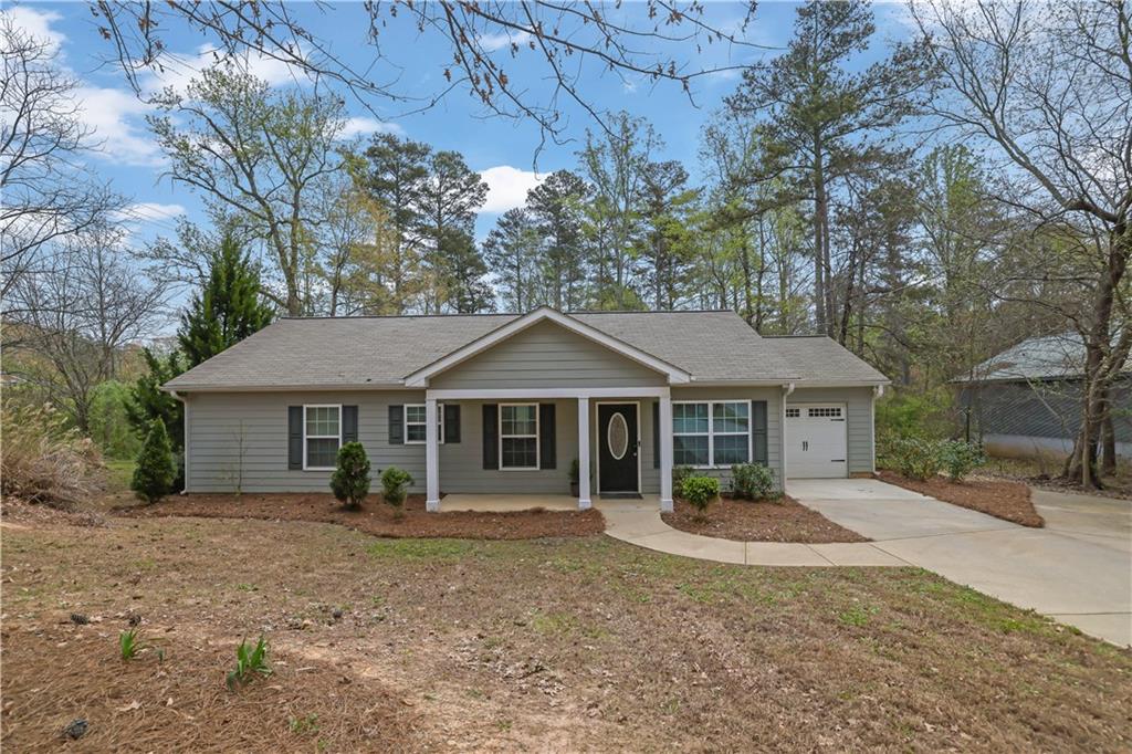 front view of a house with a yard