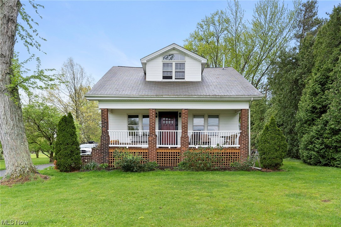 4275 West Calla Road Canfield, OH 44406 - Photo 2 of 31 View of front of property with a front lawn and a porch