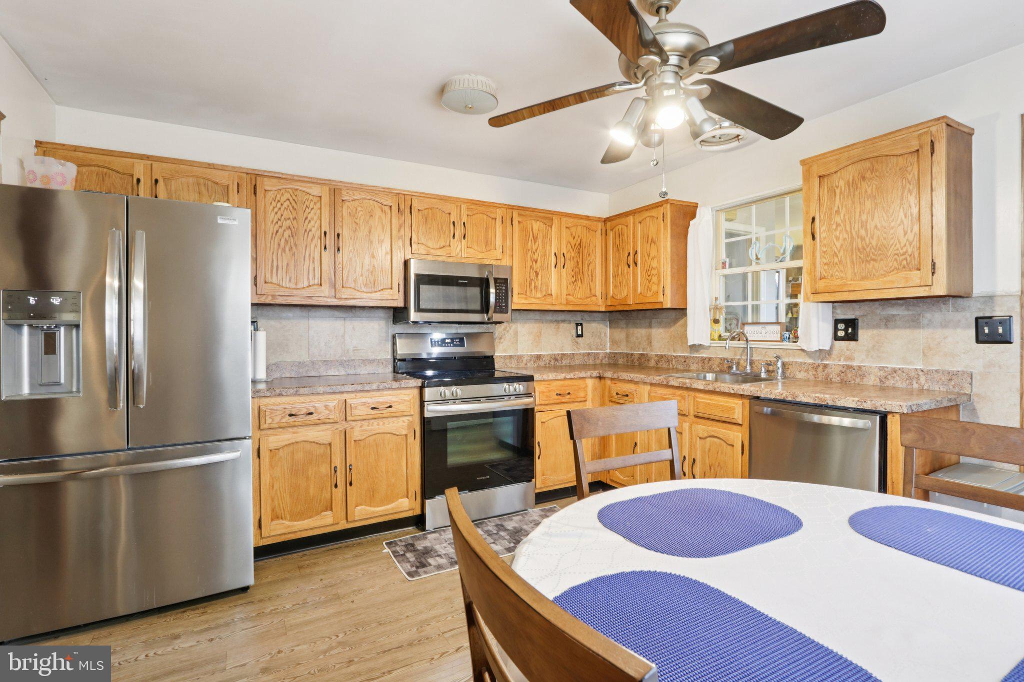 46 Gramercy Place Southampton, NJ 08088 - Photo 14 of 37 a kitchen with a sink appliances and cabinets