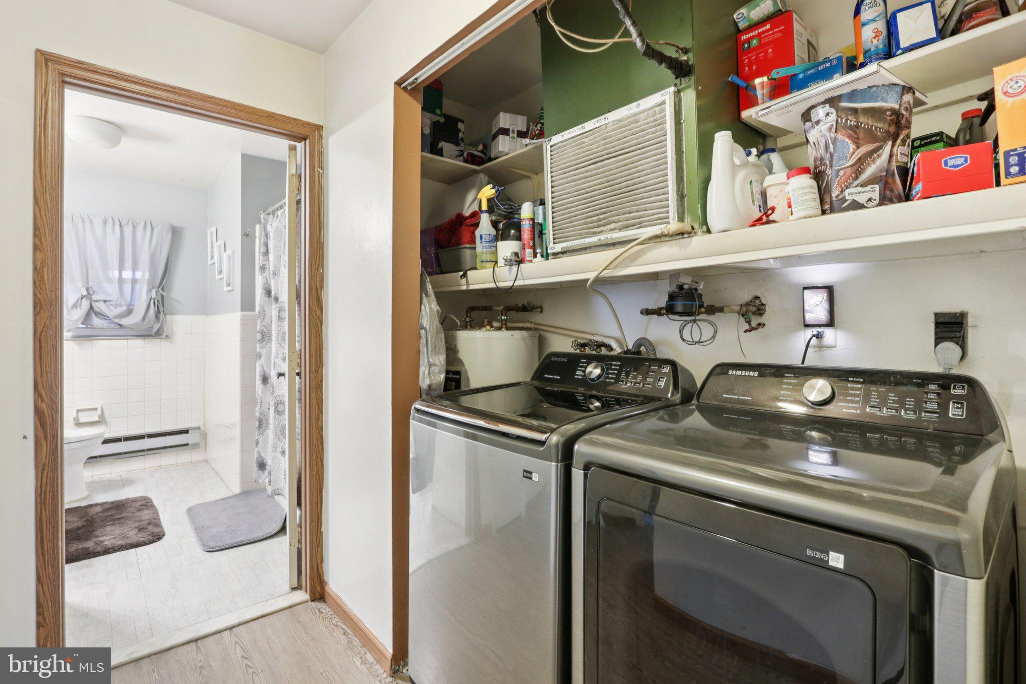 46 Gramercy Place Southampton, NJ 08088 - Photo 17 of 37 a utility room with stainless steel appliances granite countertop a stove and a refrigerator