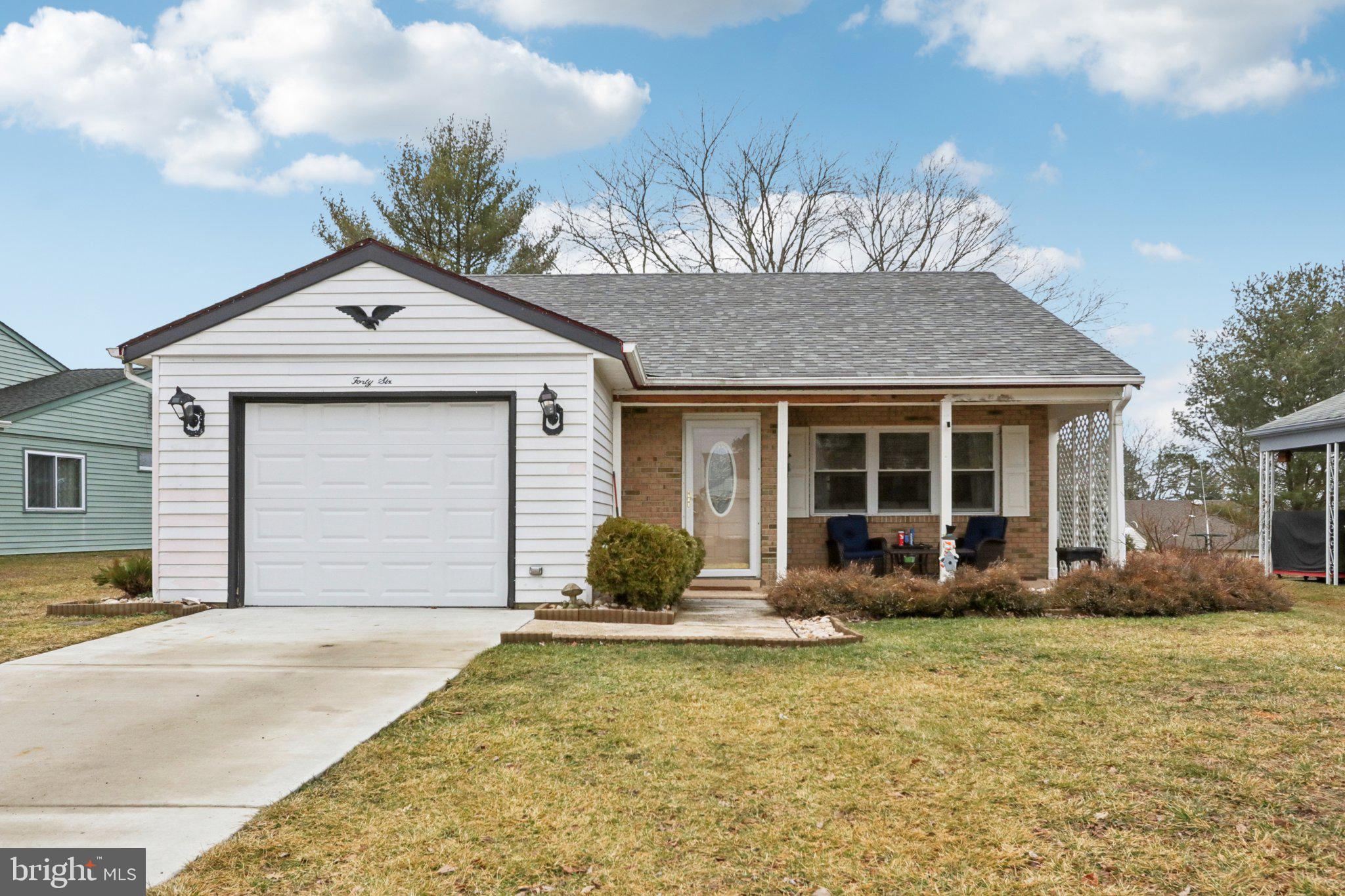 46 Gramercy Place Southampton, NJ 08088 - Photo 2 of 37 a front view of a house with garden